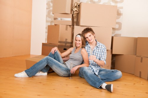 Removalists preparing household furniture for a move in Botany Bay